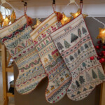 Palace Of Leaves Three Cross stitched Christmas Stockings